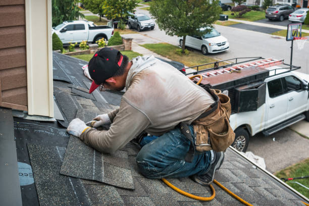Professional Flat Roof Repair technician working in Rockaway Park, NY